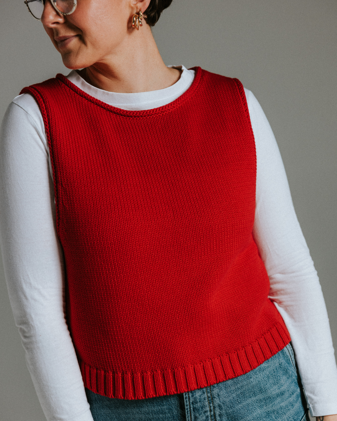 Close-up of red cotton knit tank top showing soft knit texture