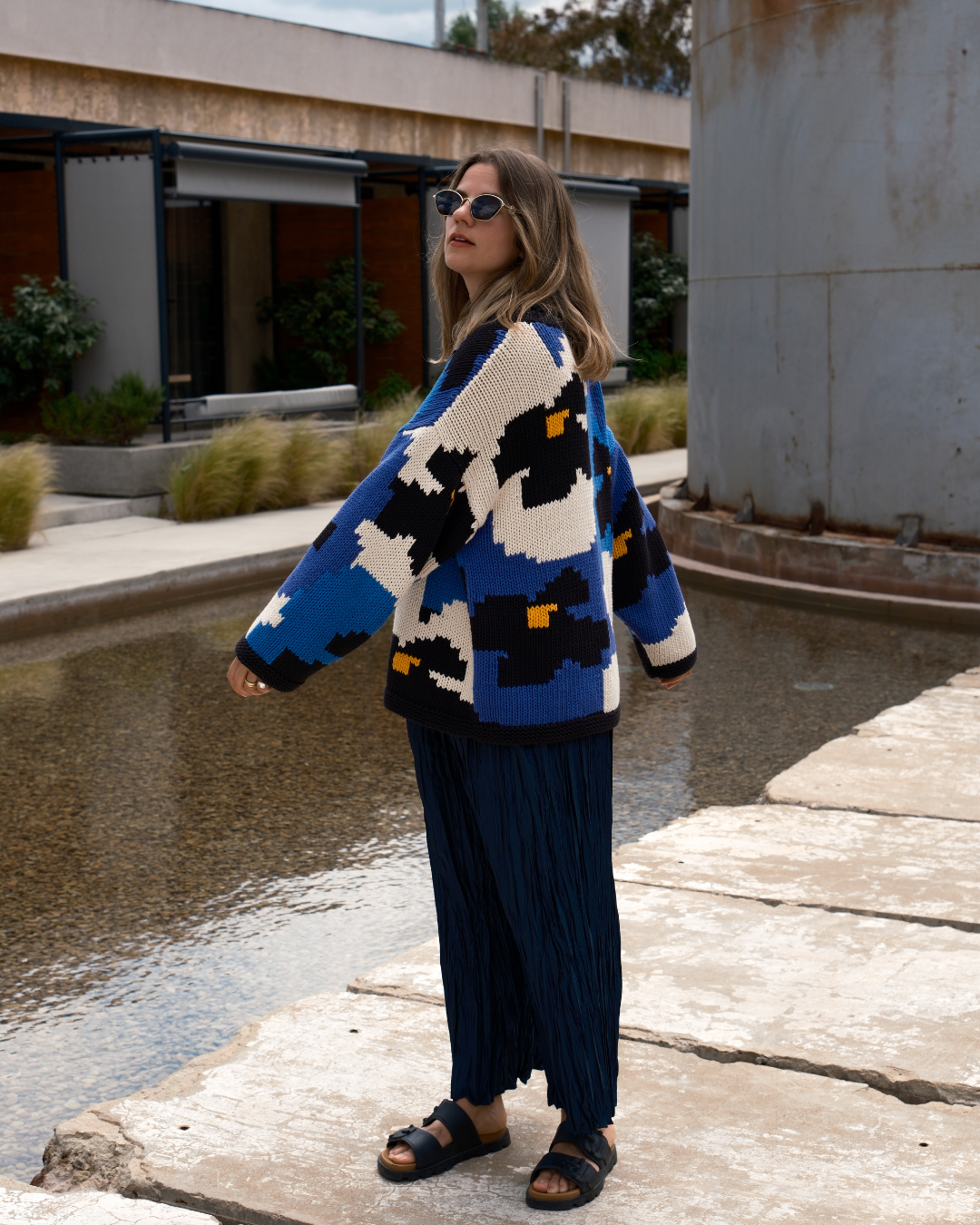 Artistic floral knit jumper inspired by the singing pansies from Alice in Wonderland