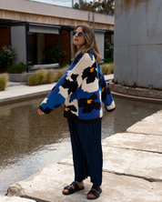 Artistic floral knit jumper inspired by the singing pansies from Alice in Wonderland