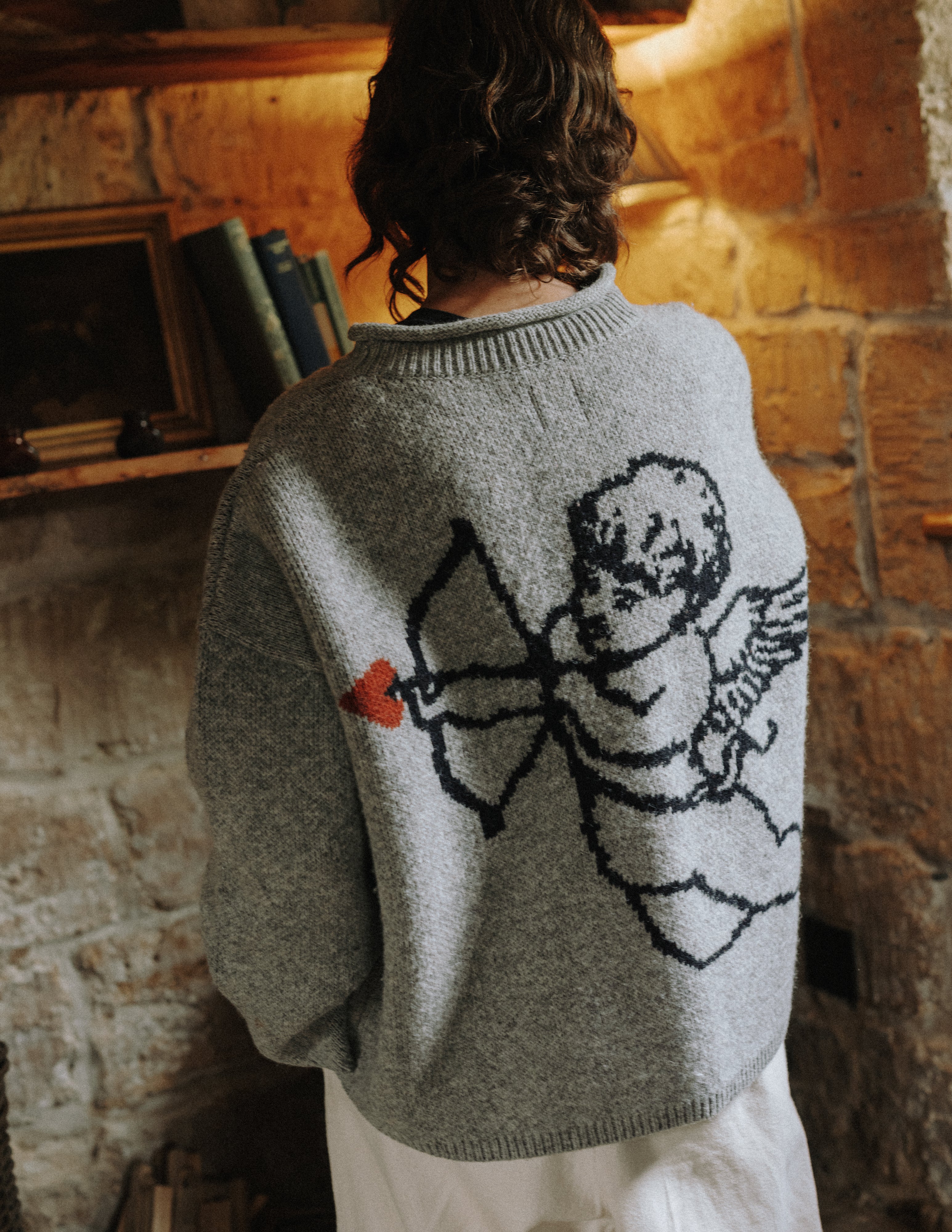 Model wearing the relaxed boxy Cherub Wool Jumper by Slow Love Knitwear