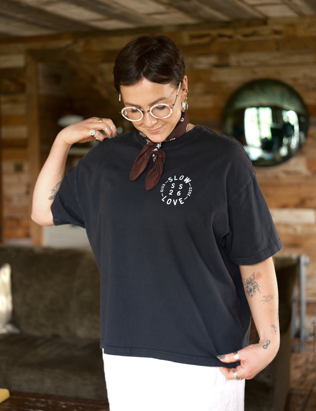 Compass faded black oversized boxy t-shirt by Slow Love Knitwear made from heavyweight organic cotton, front view.