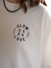 Close-up detail of the Compass graphic on an off white heavyweight organic cotton t-shirt.
