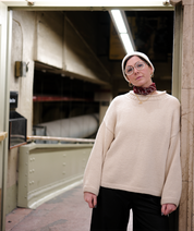 Full length fit of cream oversized cotton jumper on model