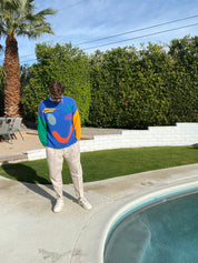 Full length view of multicoloured cotton jumper on model