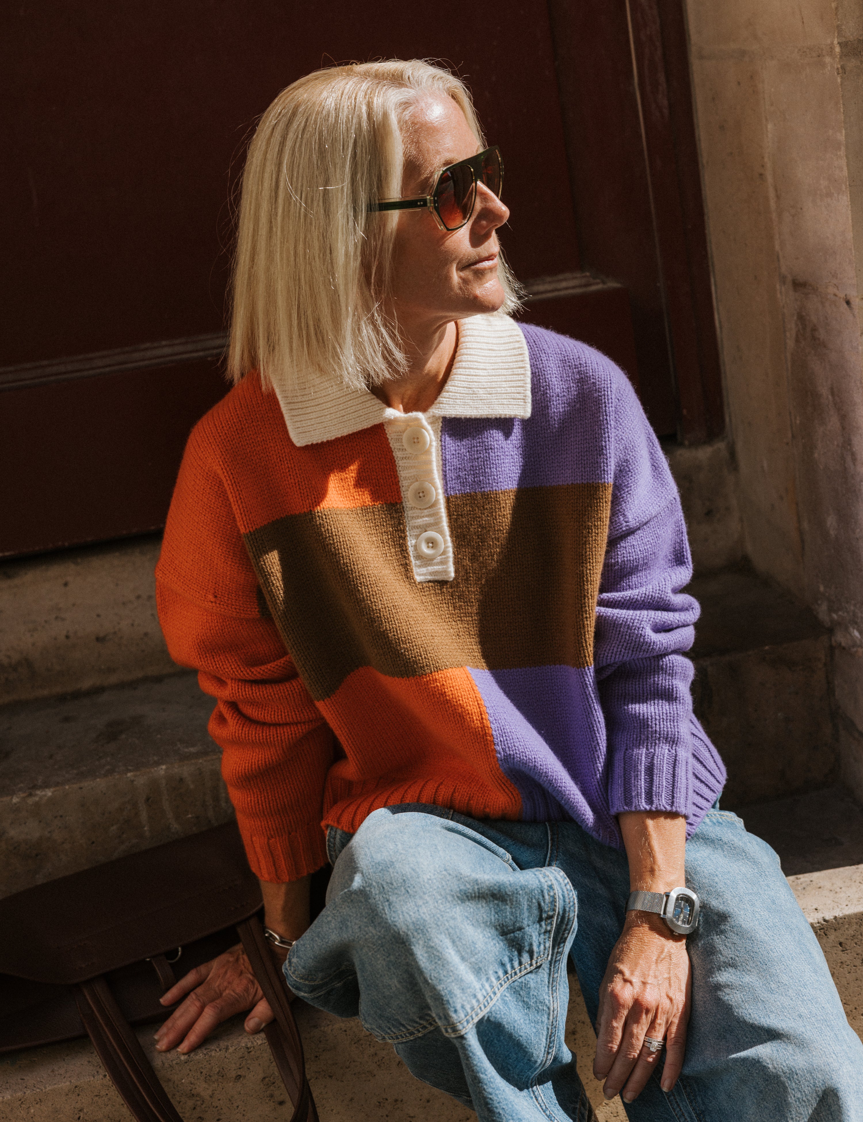Front view of the Slow Love Rugby Top in orange, purple and brown