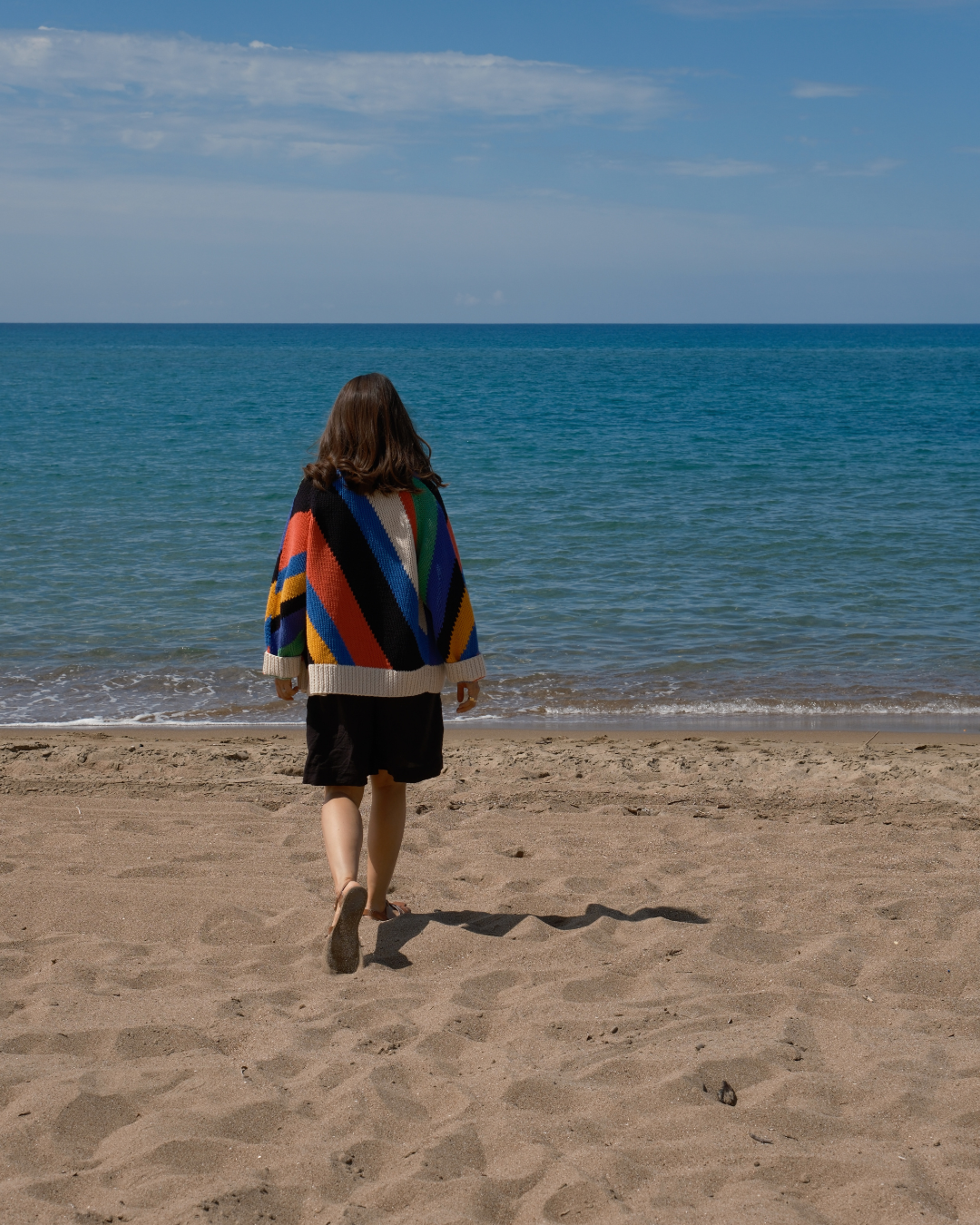 Oversized hand knit cardigan with diagonal multicolour intarsia stripes by Slow Love Knitwear