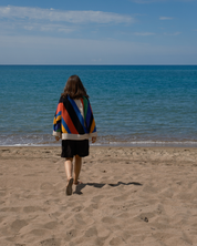 Oversized hand knit cardigan with diagonal multicolour intarsia stripes by Slow Love Knitwear