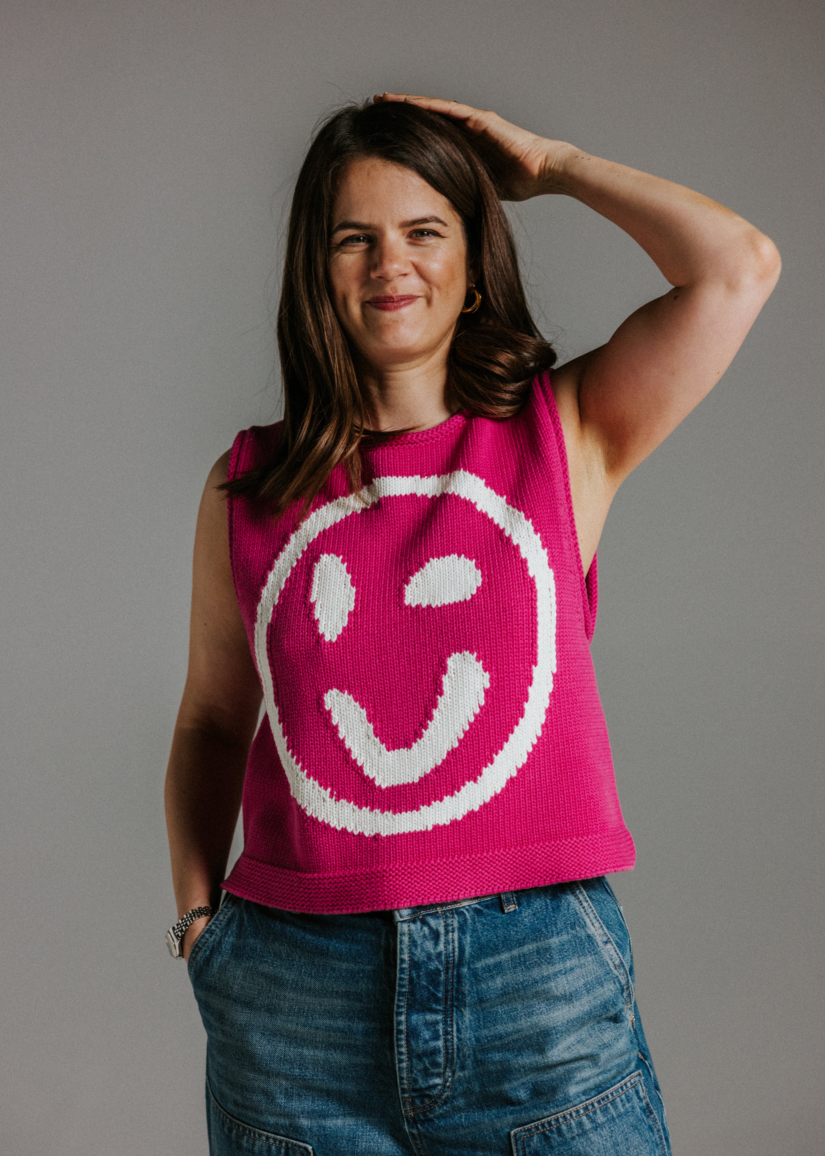 Close-up of soft 100 percent cotton knit texture on pink and white tank top