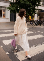 Plain hand knit jumper in cream front view