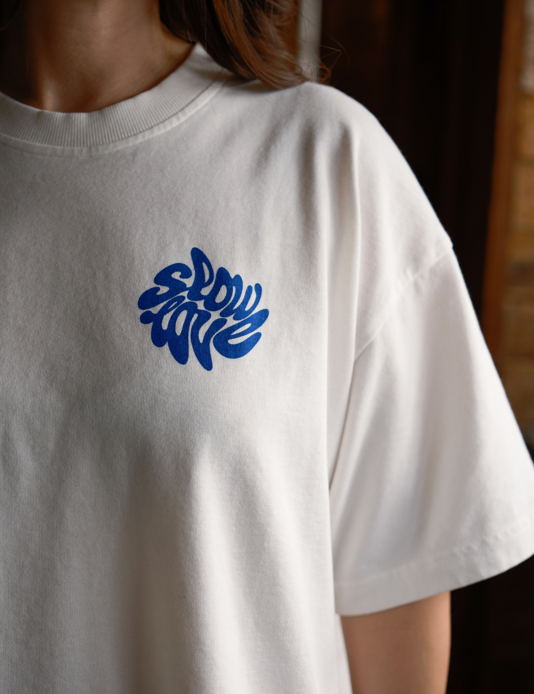 Close-up detail of the Psychedelic graphic on a heavyweight organic cotton oversized t-shirt.