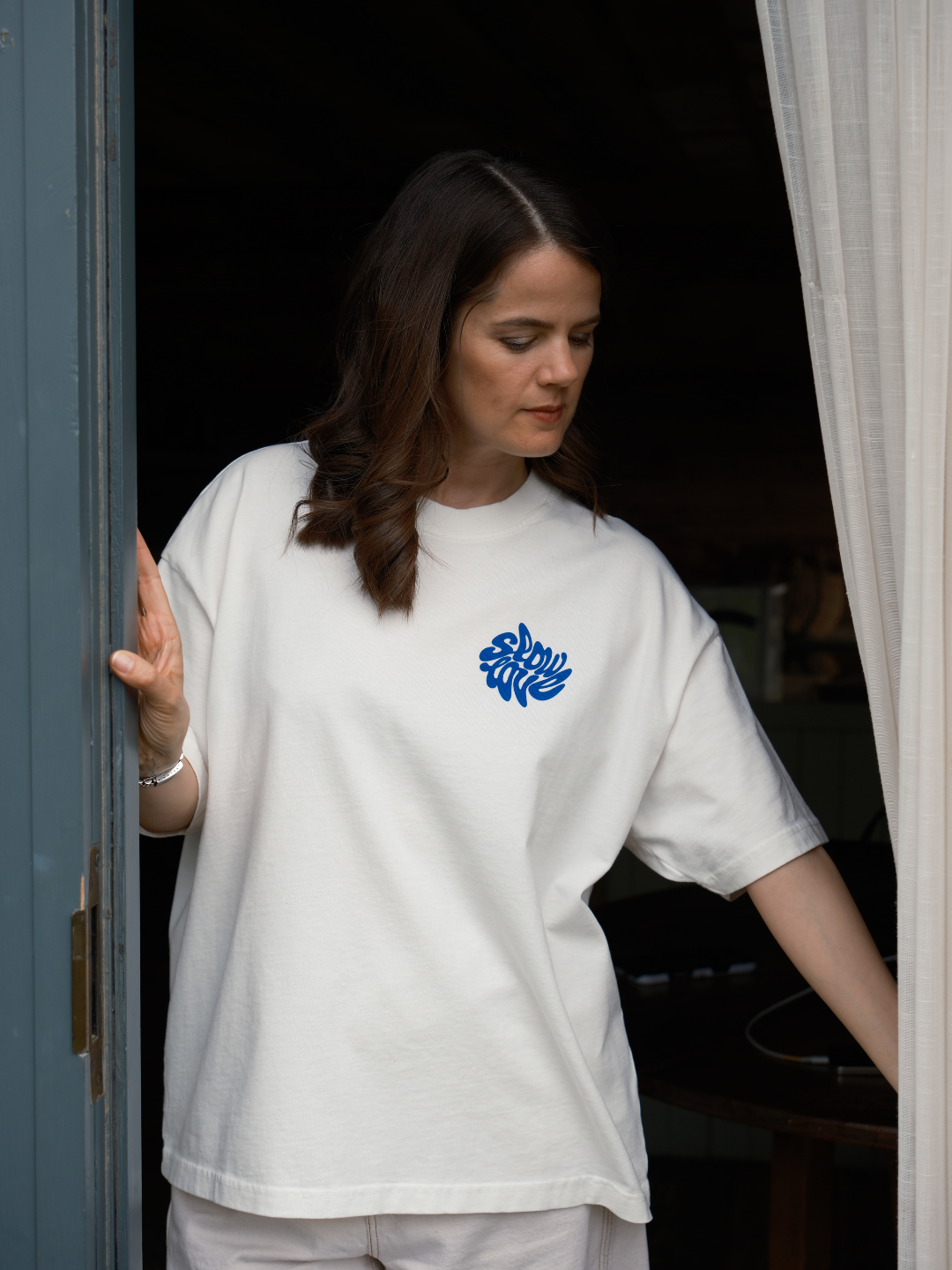 Model wearing the Psychedelic oversized boxy t-shirt with a relaxed fit and structured silhouette.