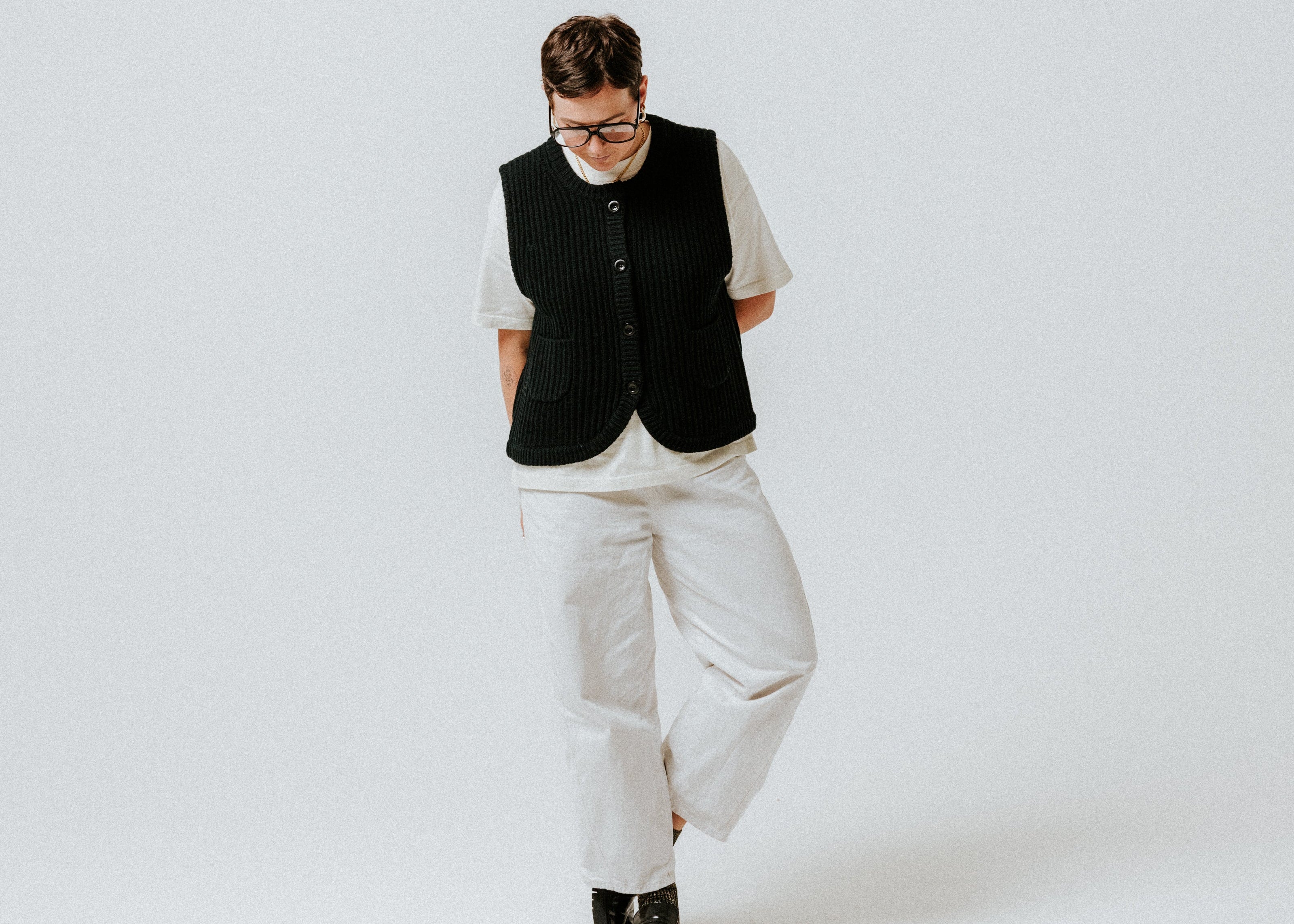 The Slow Love Black Fisherman Rib Wool Gilet styled for effortless layering through autumn, winter and spring.