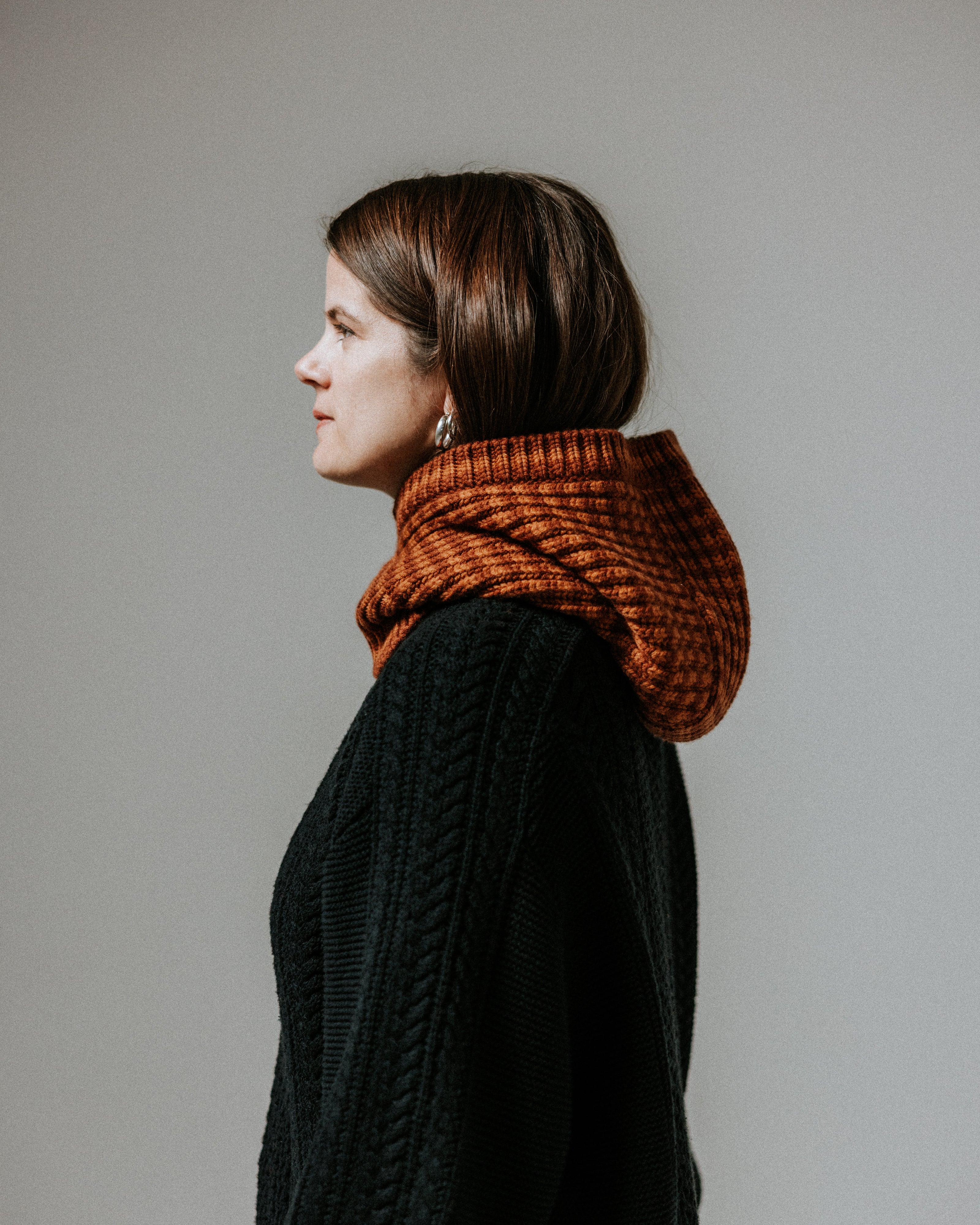 The Slow Love Fisherman Striped Merino Wool Hood in toffee and brown, knitted from 100% premium merino wool.