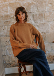 Model wearing the oversized Hazelnut Staple Crew Jumper by Slow Love Knitwear