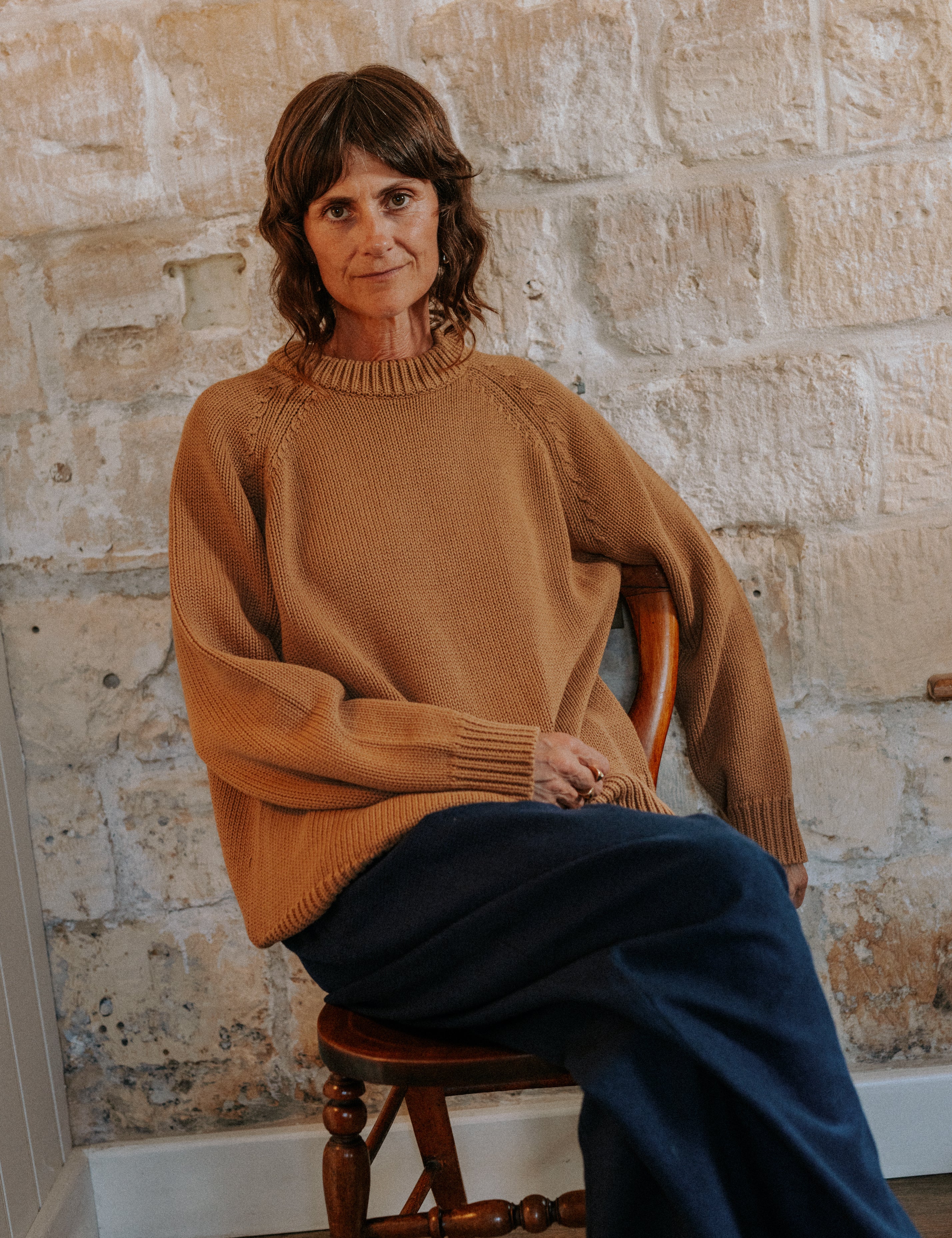 Model wearing the oversized Hazelnut Staple Crew Jumper by Slow Love Knitwear