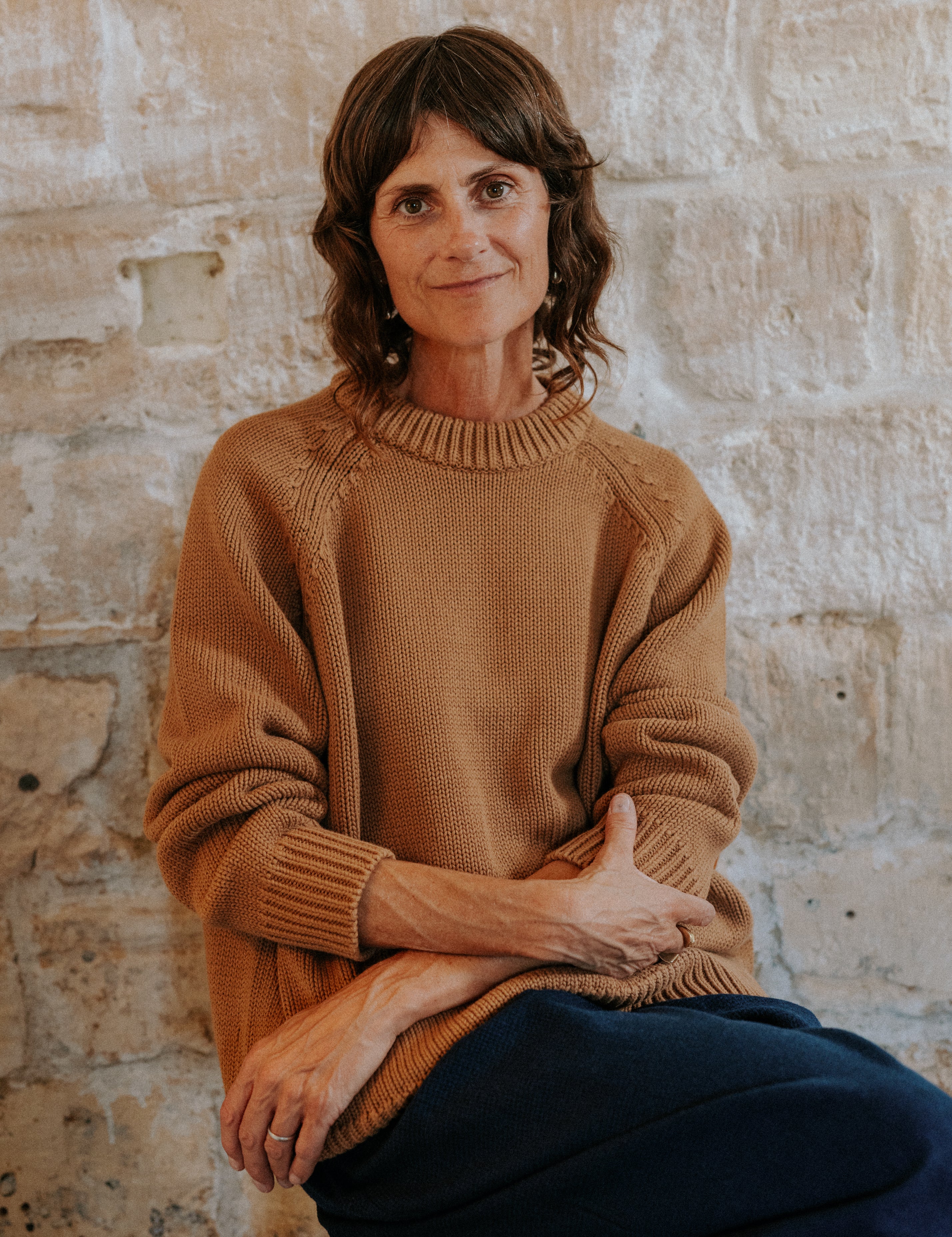 Close-up of the Feel Good motif on the Hazelnut Staple Crew Jumper