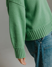 Detail of balloon sleeve on 100 percent cotton knit jumper by Slow Love Knitwear