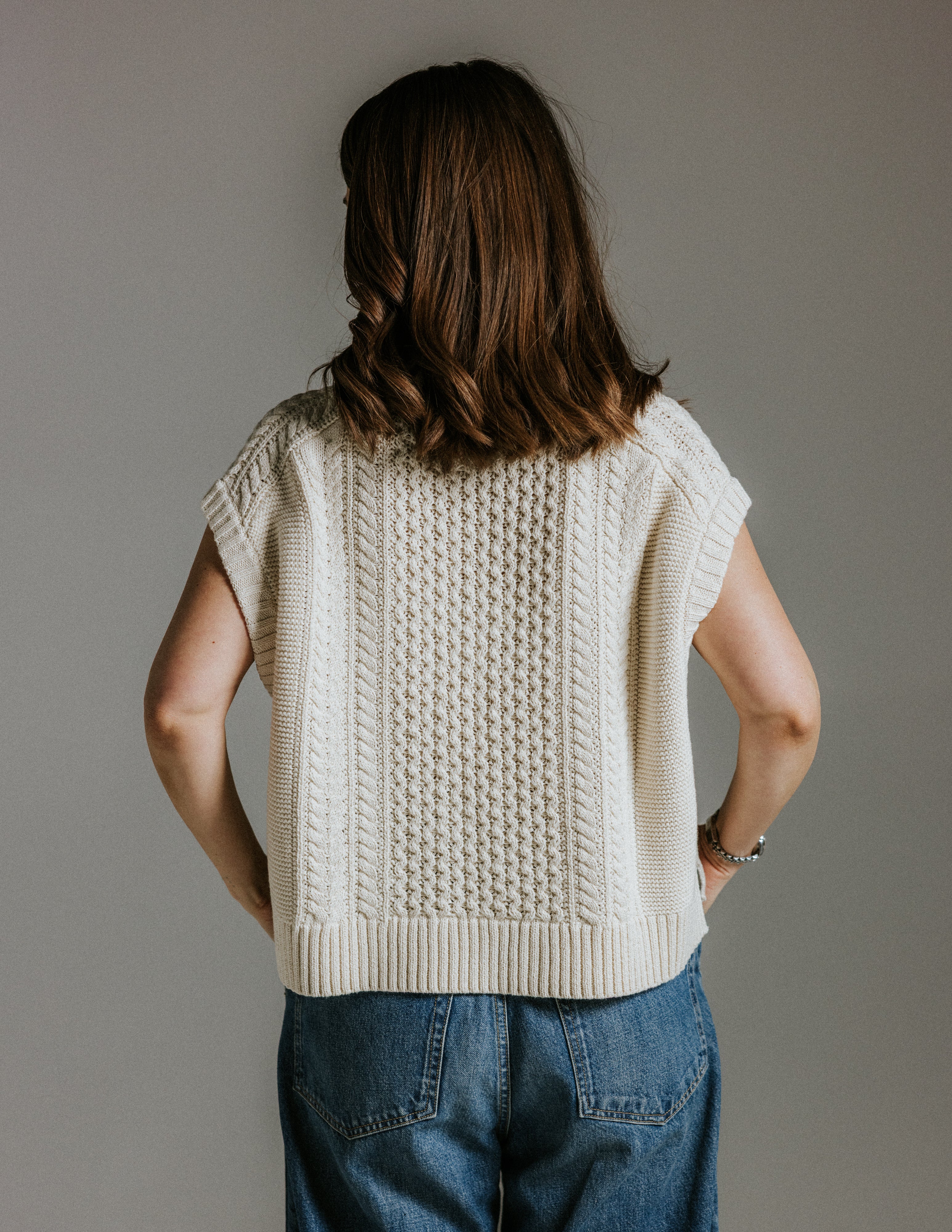 Back view of boxy cotton knit tank top by Slow Love Knitwear based on Aran jumper design