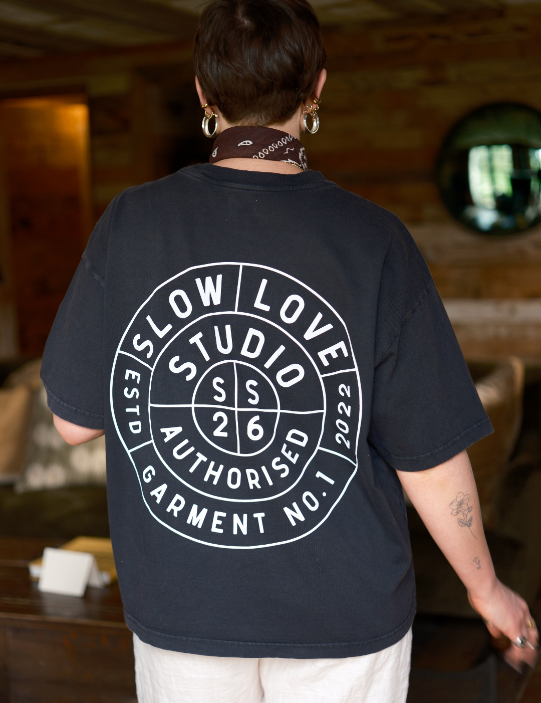 Back view of the Compass oversized boxy t-shirt in faded black organic cotton.