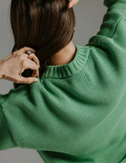 Close up of neckline on 100 percent cotton boxy knit jumper by Slow Love Knitwear showing knit texture and collar detail