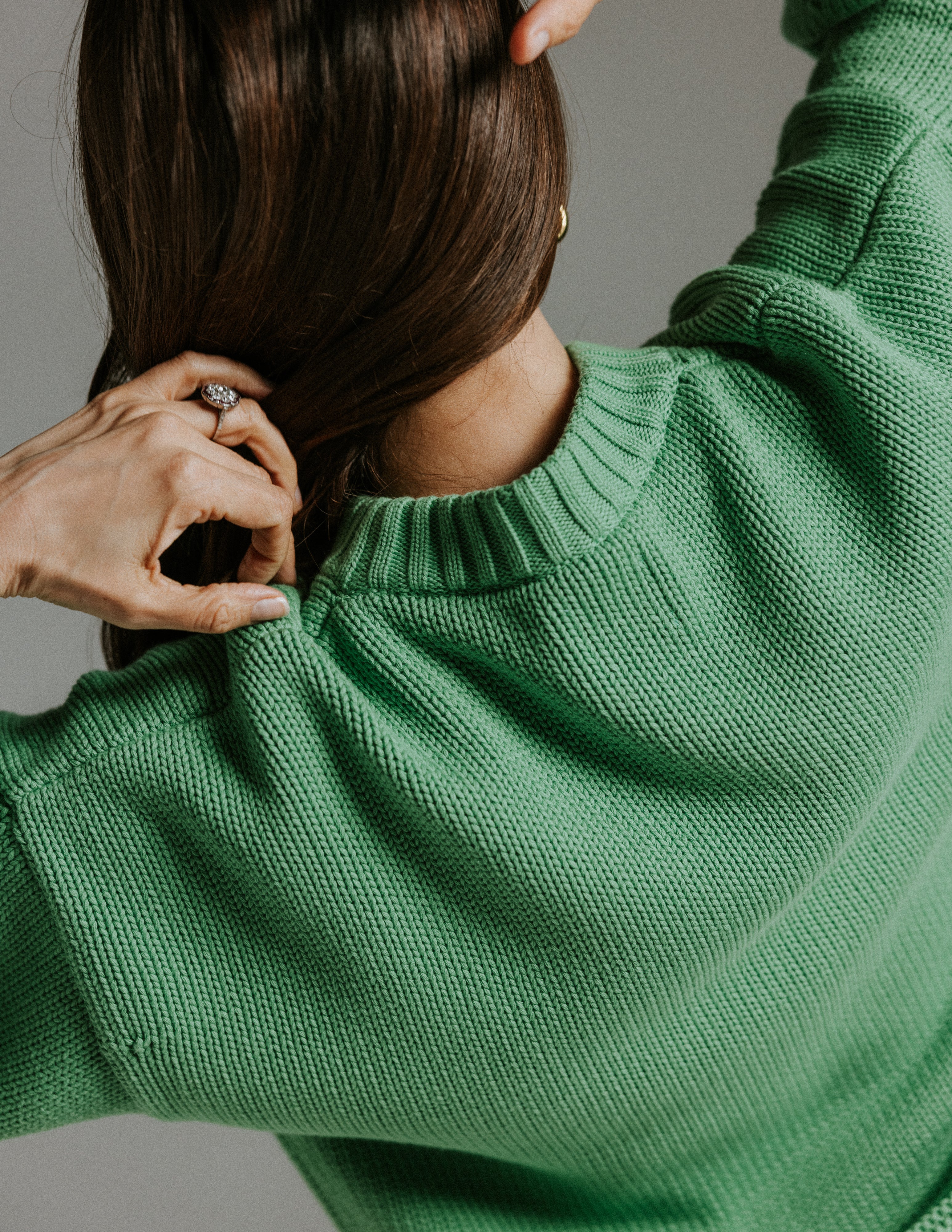 Close up of neckline on 100 percent cotton boxy knit jumper by Slow Love Knitwear showing knit texture and collar detail