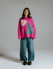 Model wearing hand knitted cotton jumper with daisy intarsia motif inspired by Matisse prints by Slow Love Knitwear