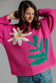 Hand knitted cotton jumper by Slow Love Knitwear with four colour intarsia daisy motif