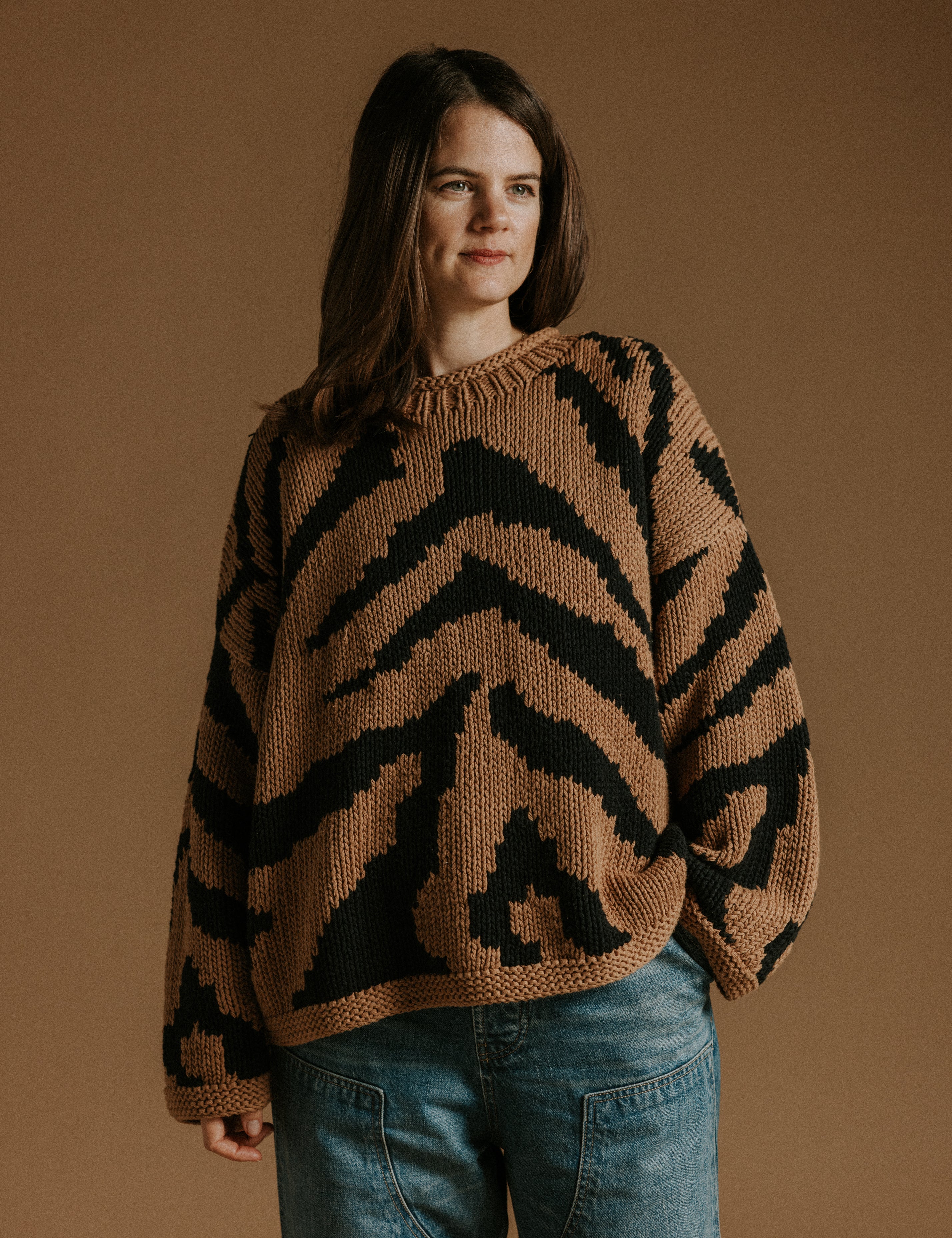 Hand knitted cotton jumper by Slow Love Knitwear with two colour intarsia tiger pattern