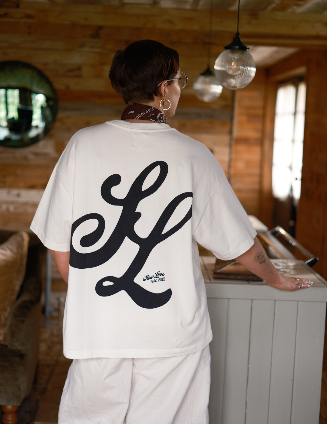 Off white Slow Love Script t-shirt by Slow Love Knitwear crafted from premium 250gsm organic cotton.