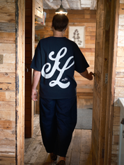 SL Script faded black t-shirt by Slow Love Knitwear crafted from premium 250gsm organic cotton.