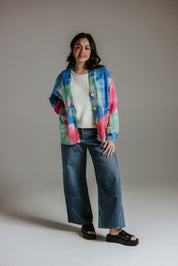 Hand tie-dyed cotton knit cardigan showing unique sun-washed colour variation by Slow Love Knitwear