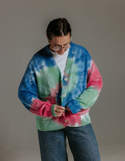 Model wearing slouchy hand tie-dyed cotton cardigan inspired by Californian surfers by Slow Love Knitwear