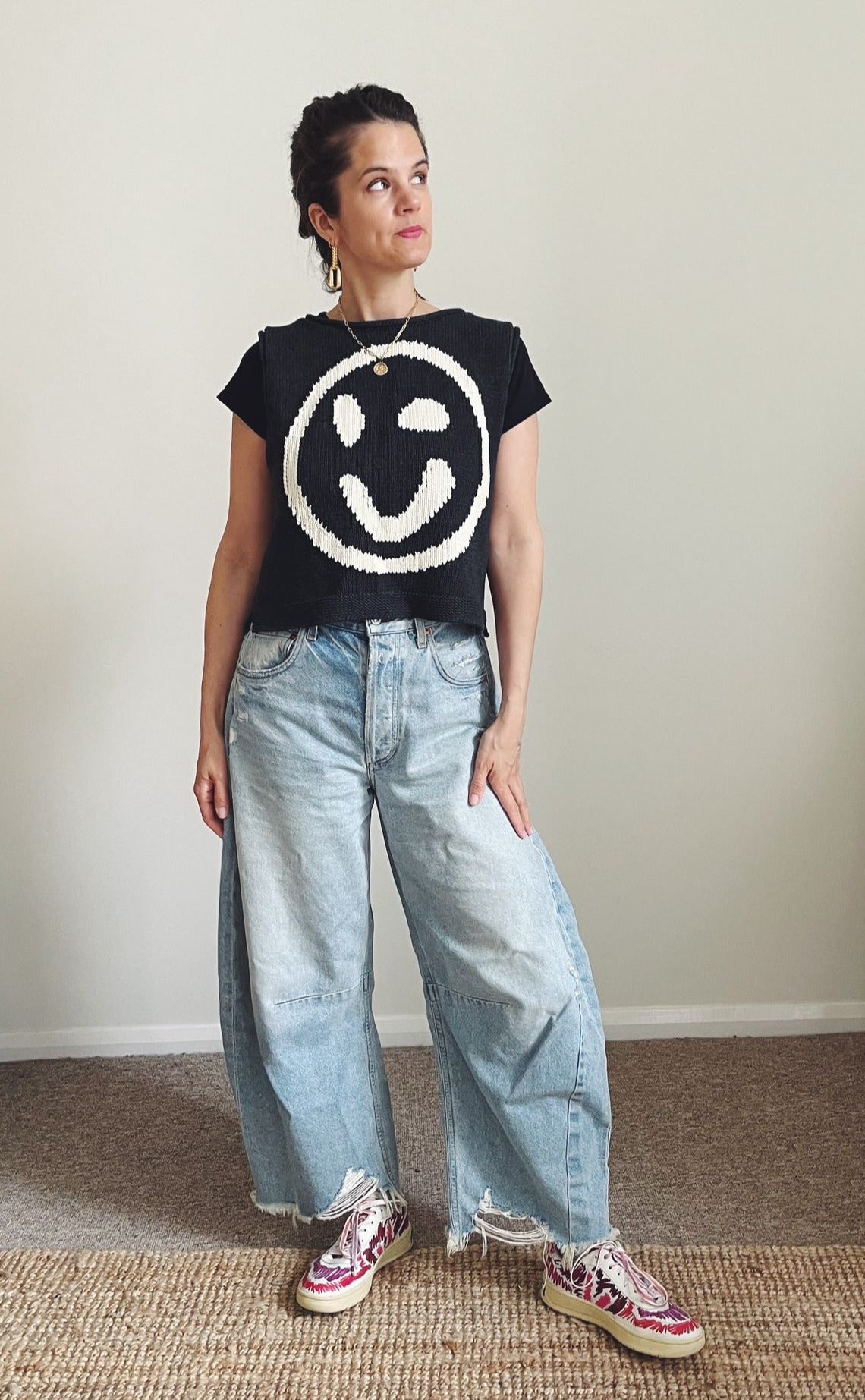 The Slow Love Old Skool Tank Top in charcoal, featuring an iconic intarsia design and relaxed, boxy fit.