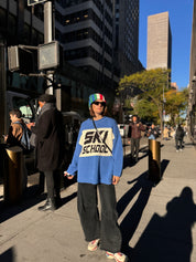 Slow Love Ski School Jumper showcasing its relaxed, oversized silhouette inspired by classic 1980s ski style.