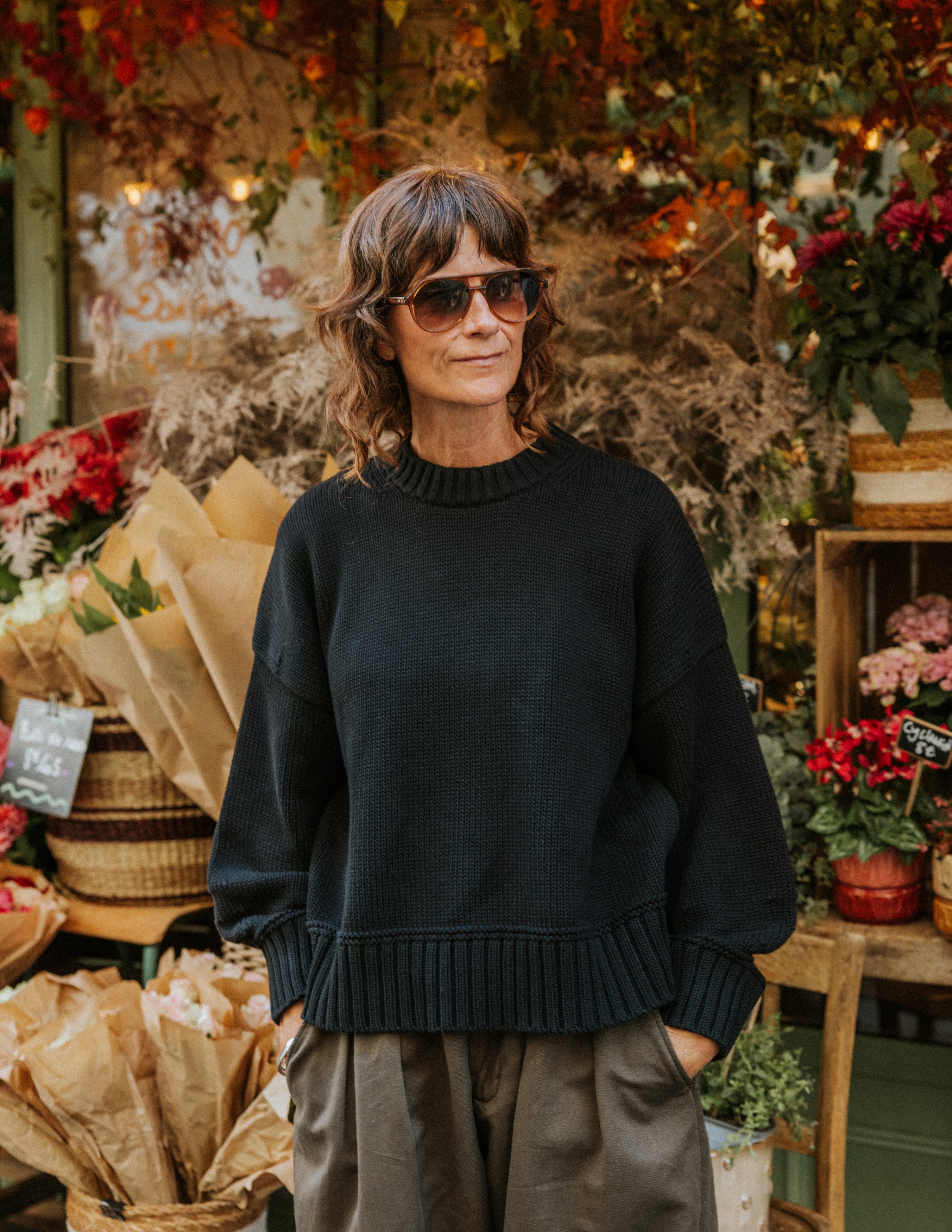 The Slow Love Staple Balloon Jumper in faded black with an oversized boxy fit and balloon sleeves.