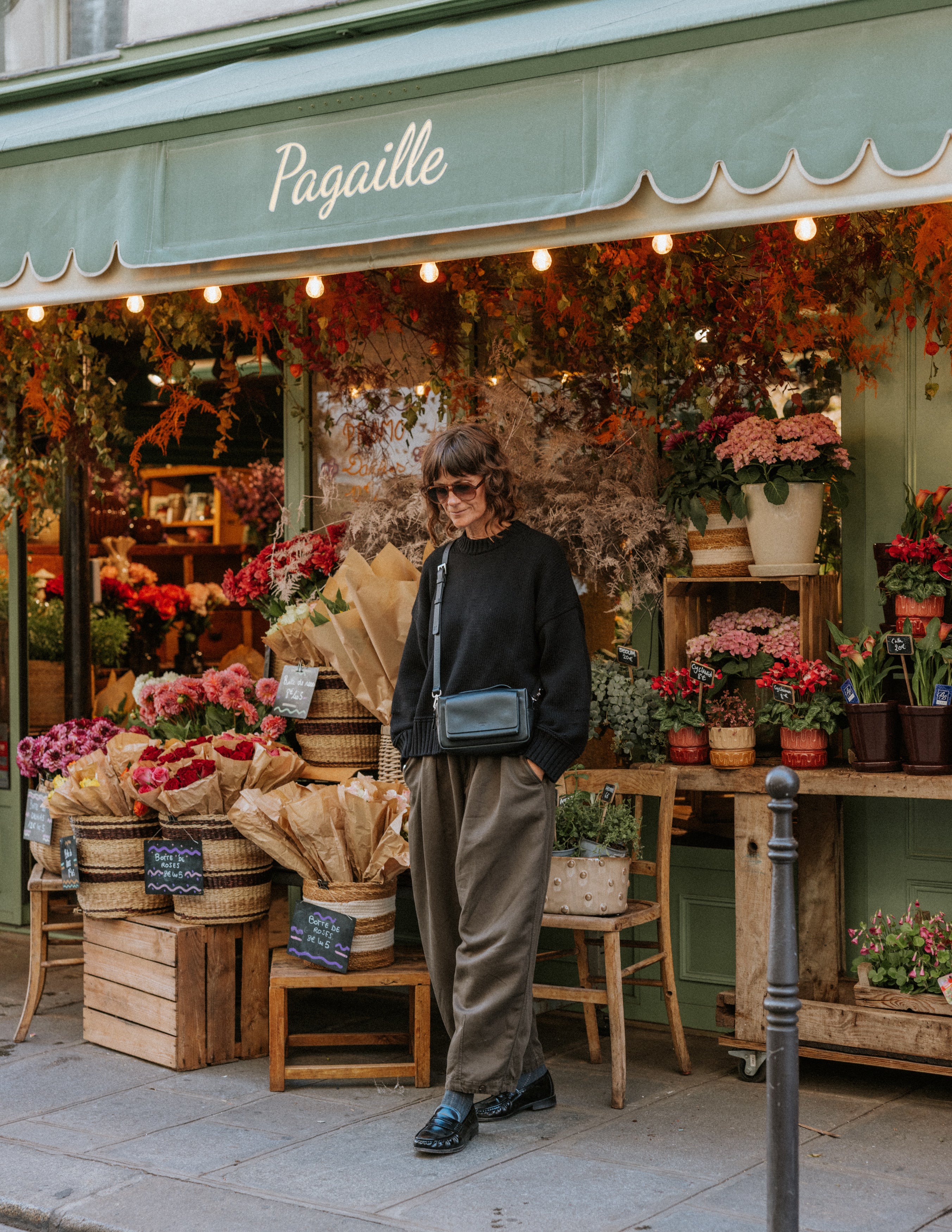 The Slow Love Staple Balloon Jumper in faded black, styled with an oversized boxy shape for a relaxed, timeless look.