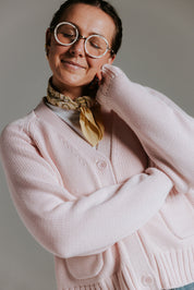Raglan sleeve detail on The Staple Cardigan in mallow pink cotton knit
