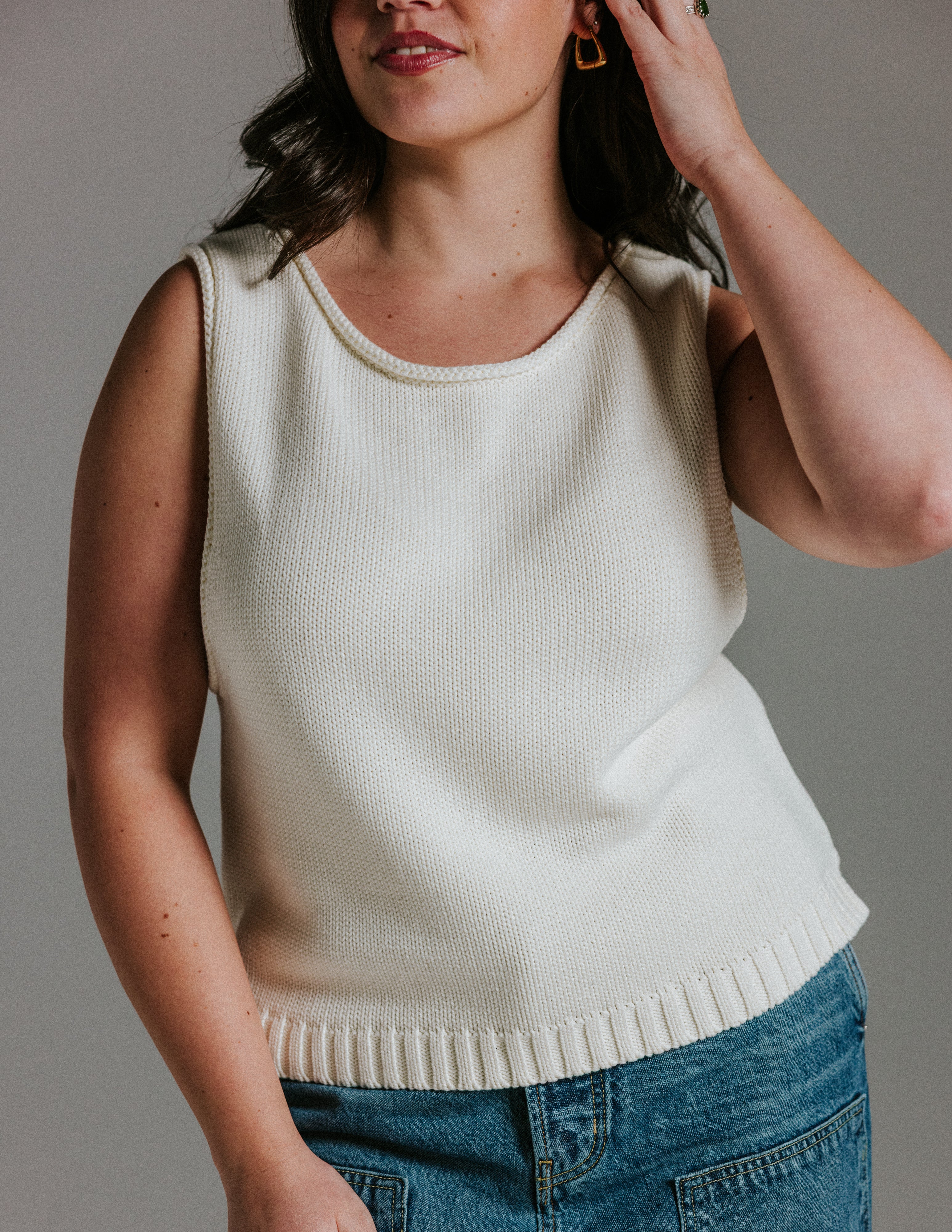 Detail of rounded neckline on The Staple Tank in panna cotta cream cotton knit