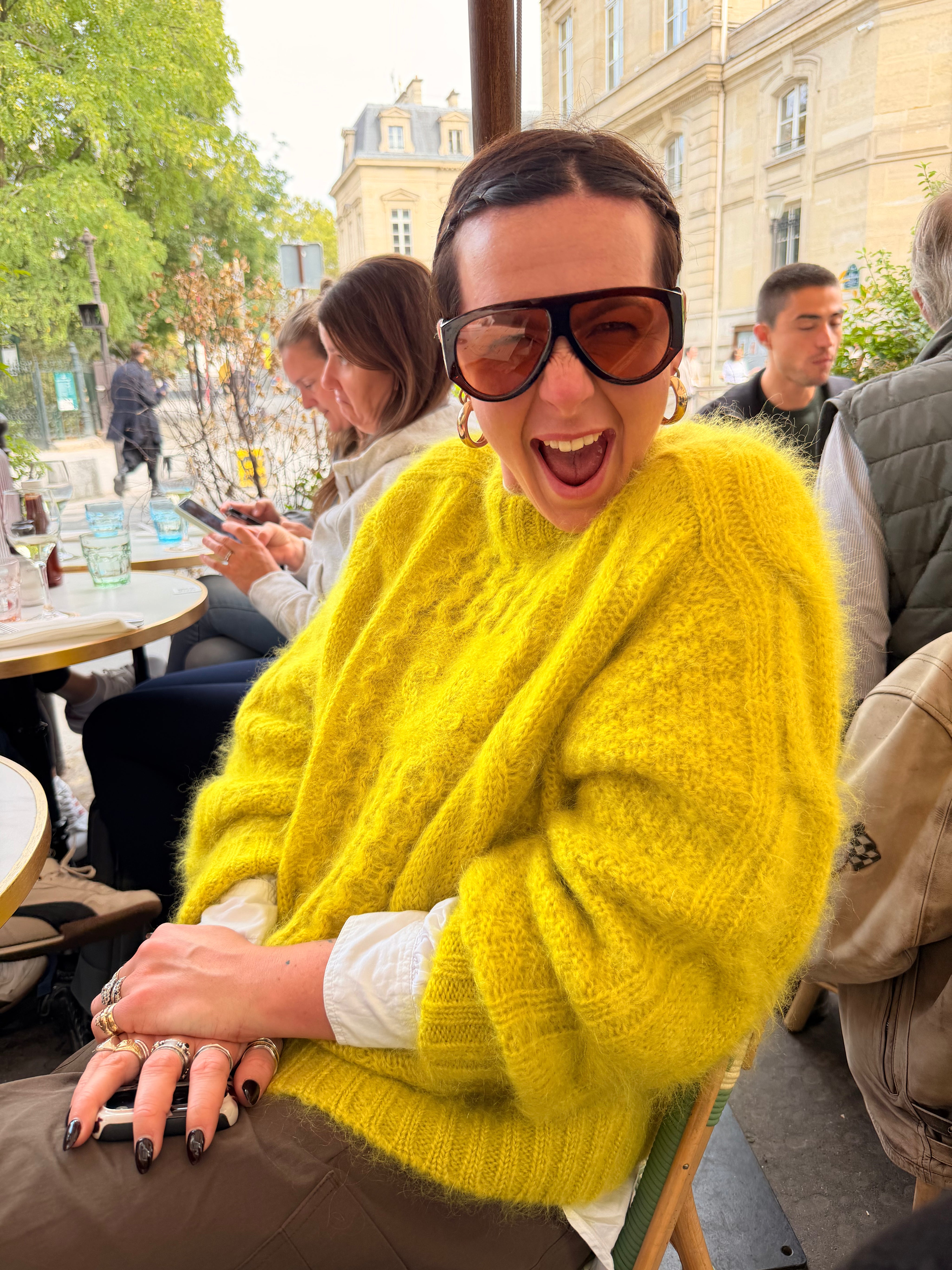 Bright chartreuse Slow Love Aran jumper with saddle sleeves and subtle SL detailing