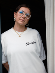 White Slow Love Studio oversized boxy t-shirt by Slow Love Knitwear made from heavyweight 250gsm organic cotton, front view.