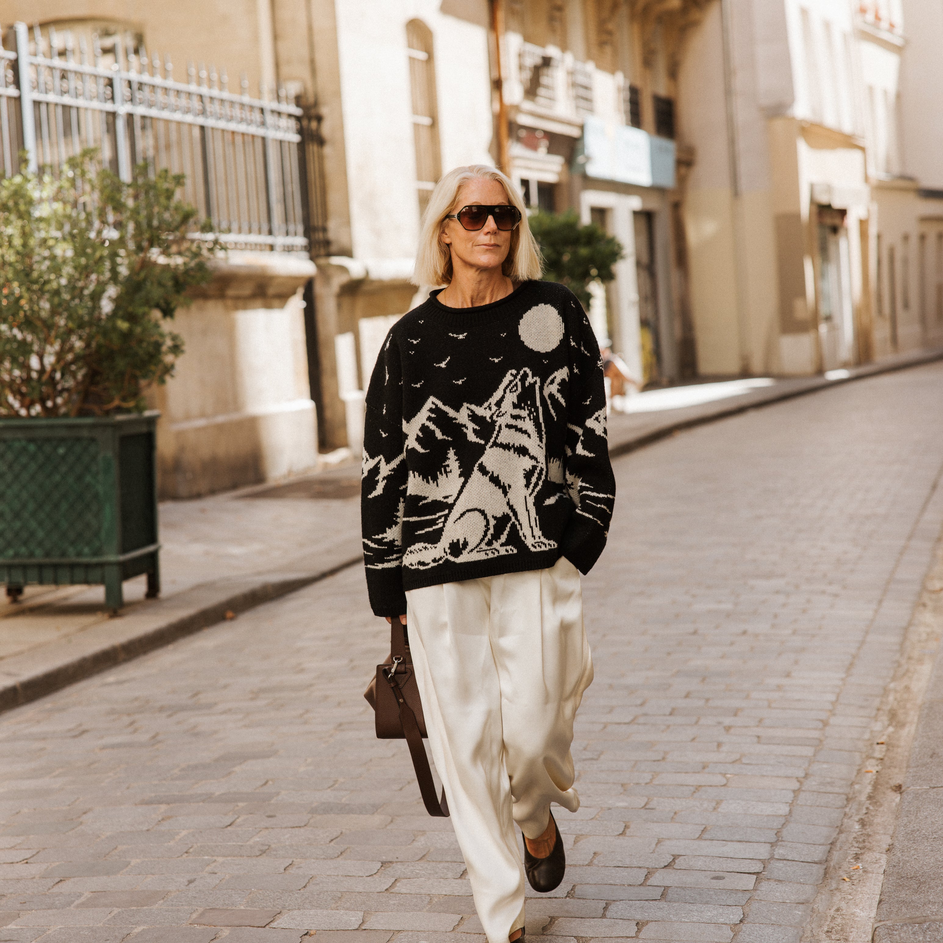 Black and ecru Wolf Wool Jumper by Slow Love with 80s-inspired wolf motif