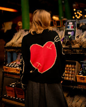 Back view of black oversized hand knitted cotton jumper