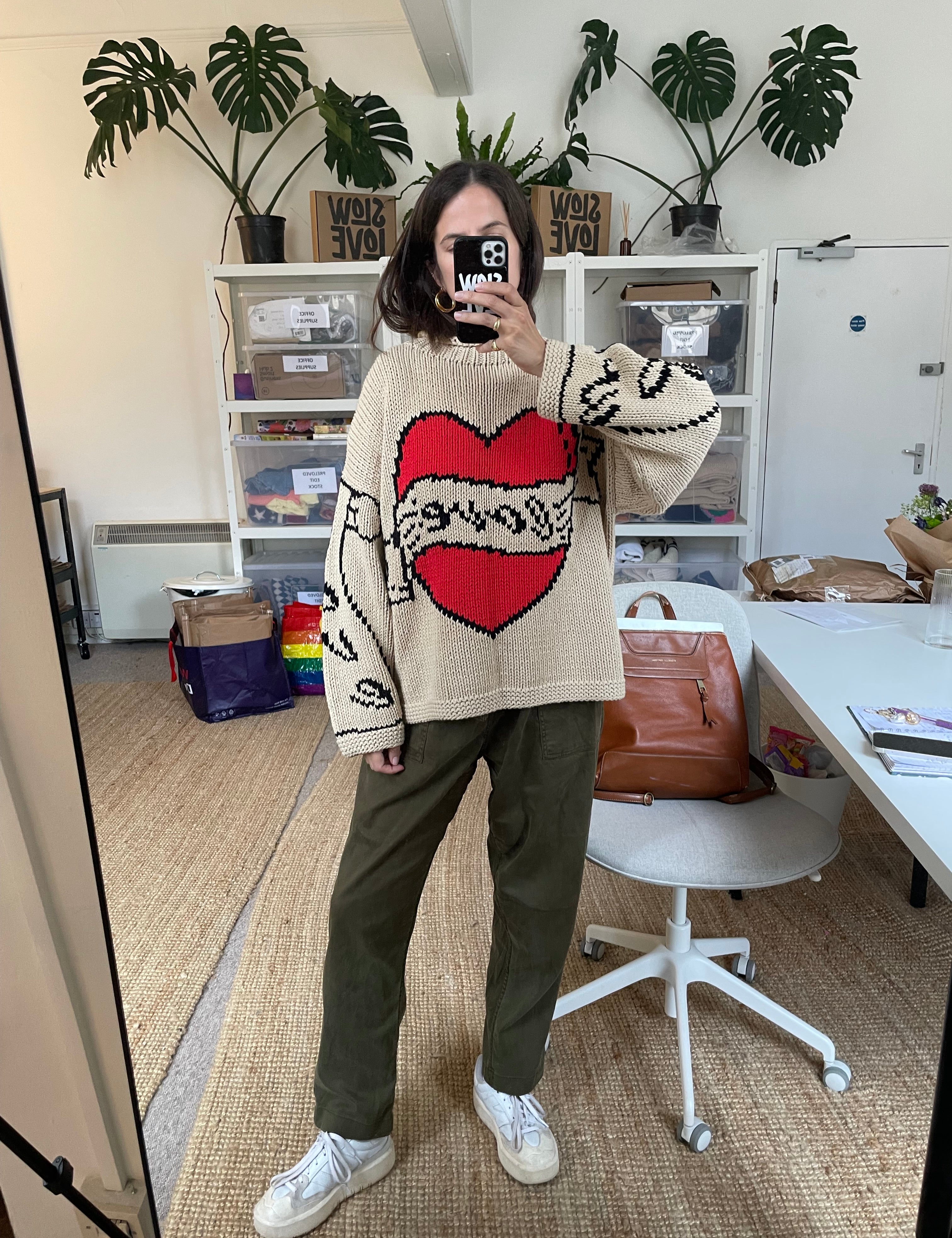 Front view of Young Hearts hand knit jumper in ecru