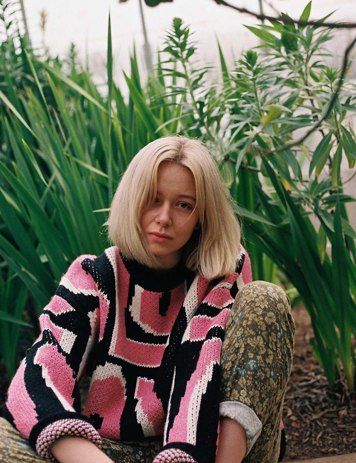 Wild Love pink wool jumper by Slow Love featuring a boxy oversized fit and birdseye jacquard knit.